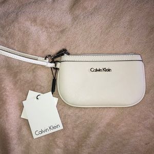 Brand new white Calvin Klein wristlet